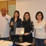 Speaker with the token of appreciation (L-R Hubert Qua, Vicky Martinez, Mylene Abiva, Aimee Flordeliza)